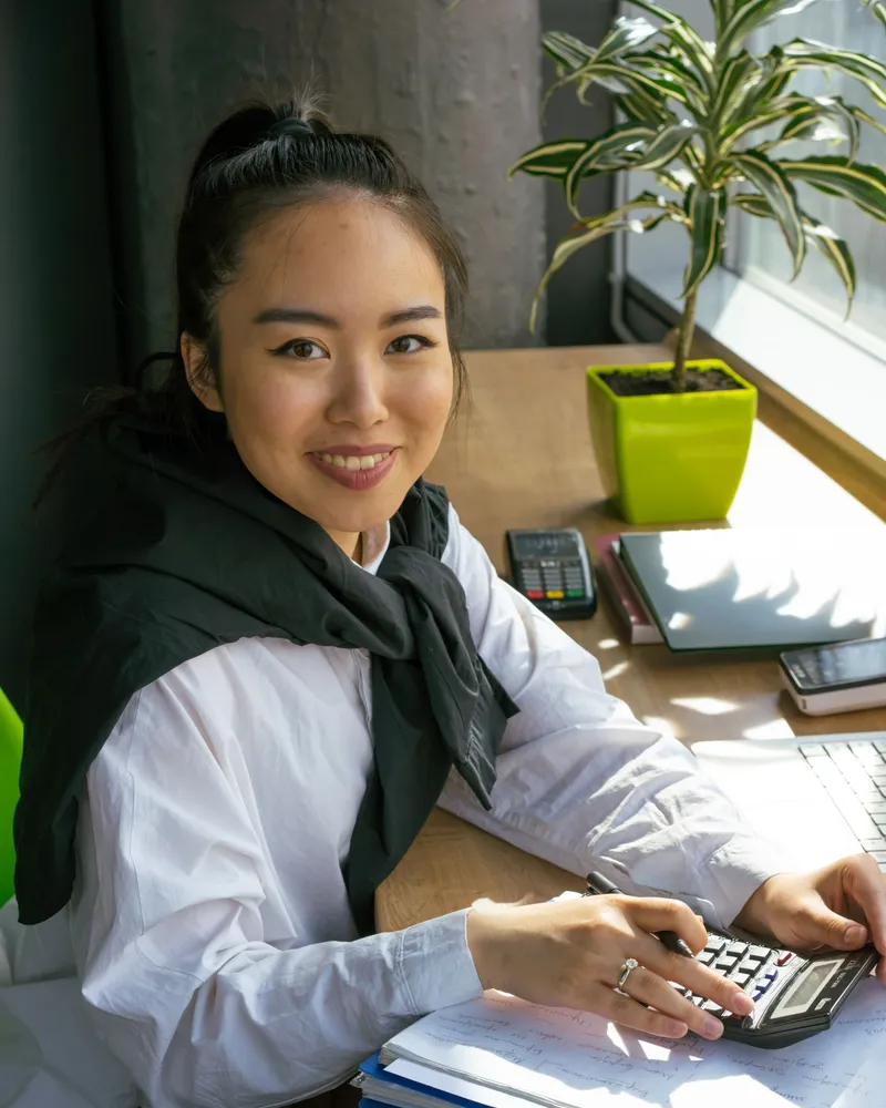 An accountant working through a set of books